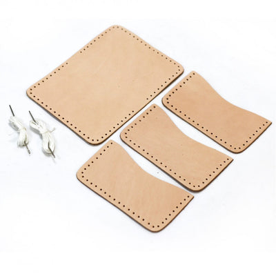 Set of beige leather card holders on a white background