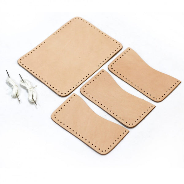 Set of beige leather card holders on a white background